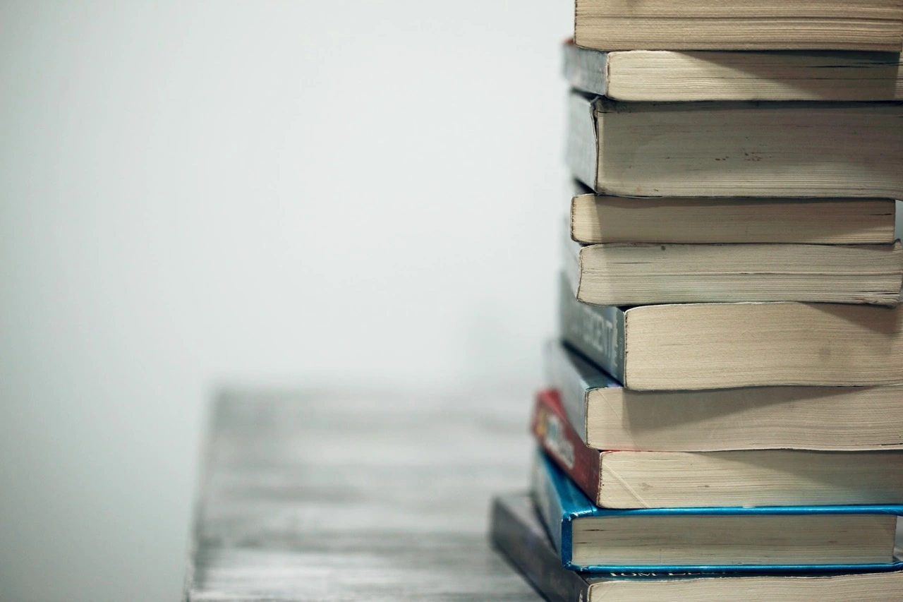 Pile of books on a table